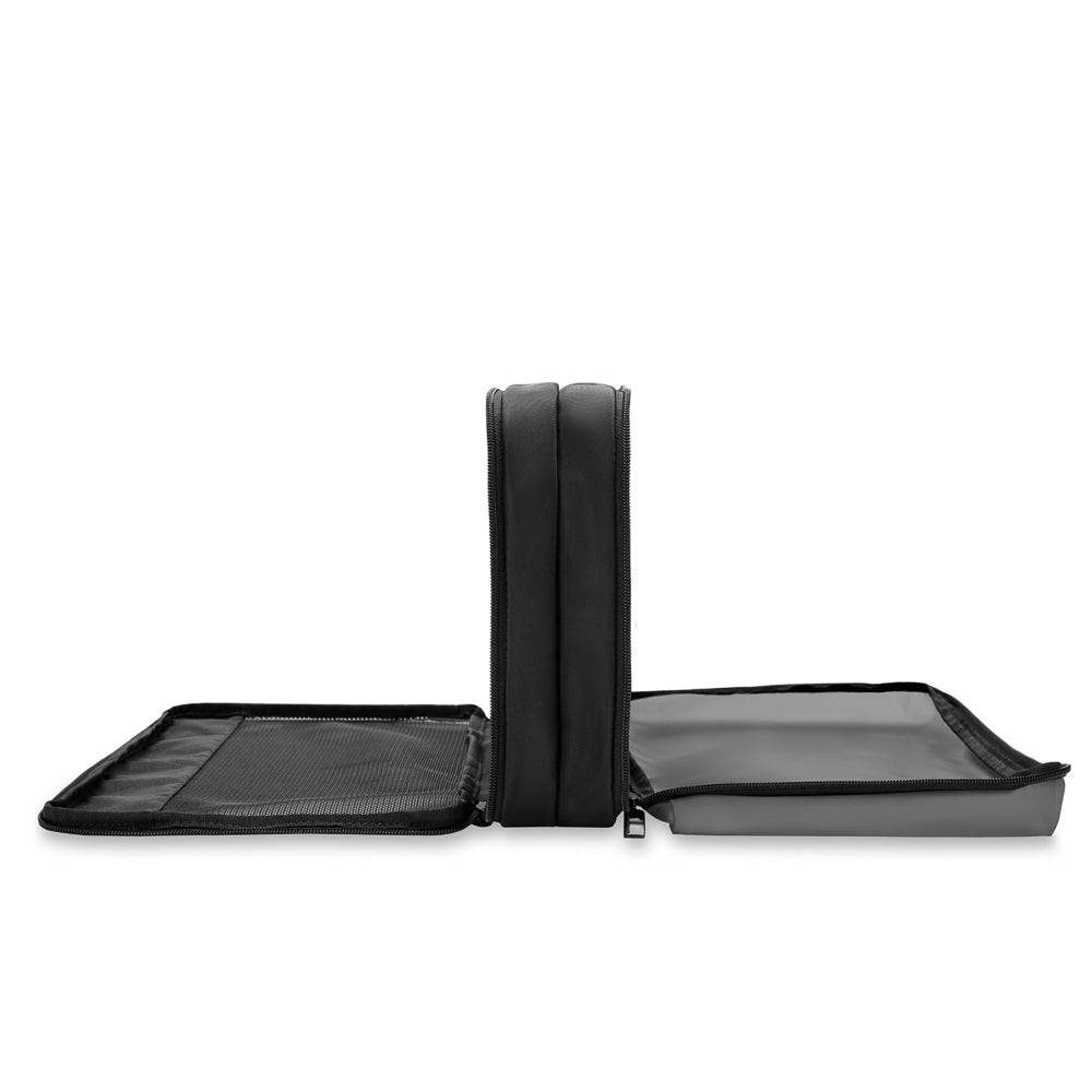 Briggs & Riley double-sided packing travel cube in black, showcasing compartments for organized travel accessories.