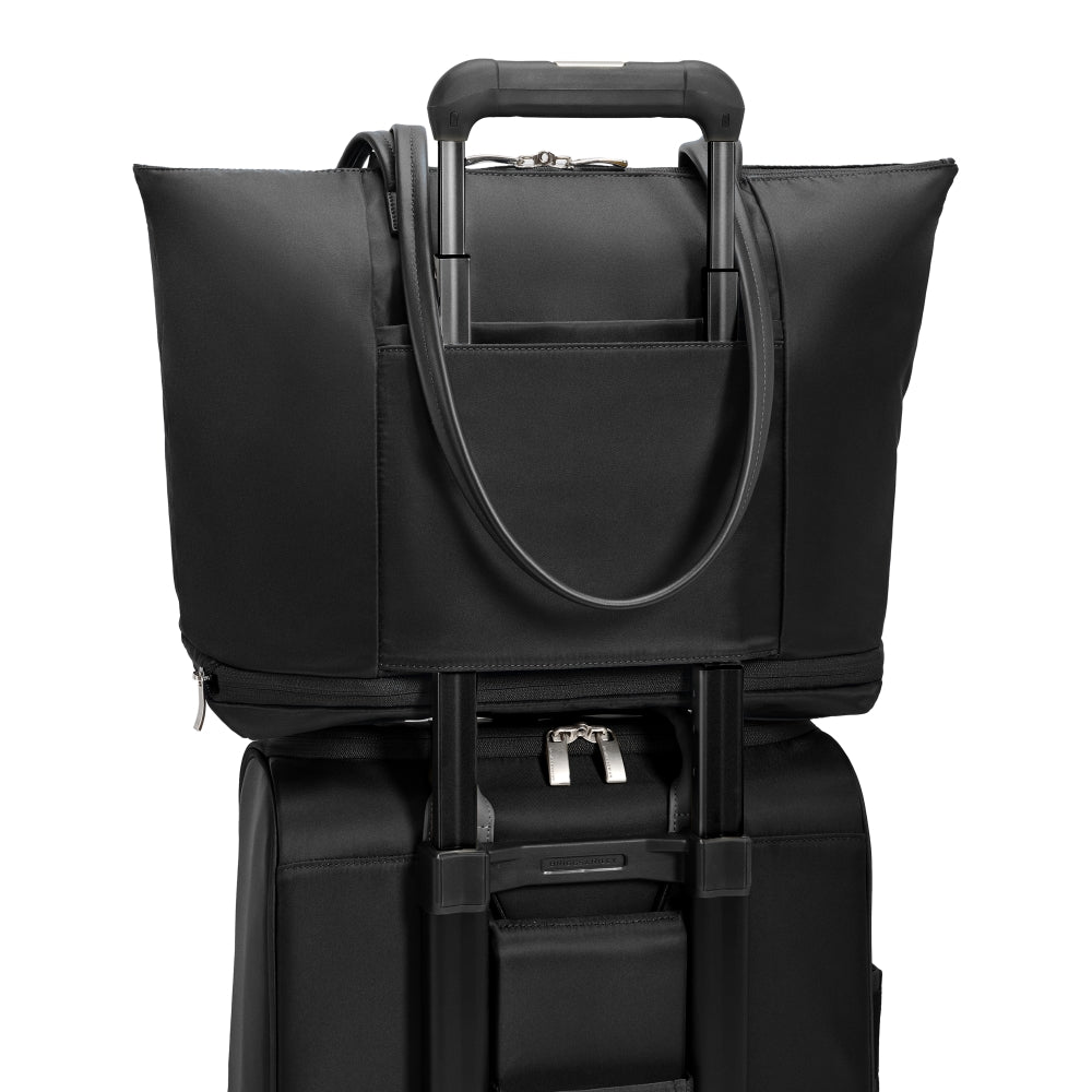 Briggs & Riley Rhapsody expandable travel tote bag in black with sturdy handles and spacious interior for travel essentials.