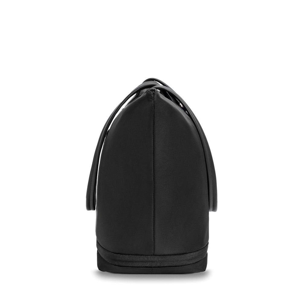 Briggs & Riley Rhapsody expandable travel tote bag in black, featuring spacious compartments and durable fabric.
