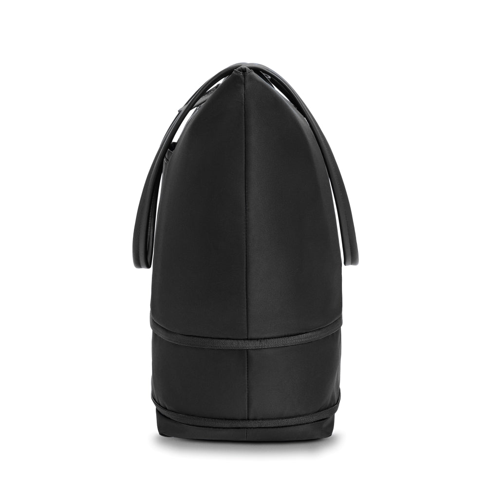 Briggs & Riley Rhapsody expandable travel tote bag in black, showcasing spacious design and durable fabric.