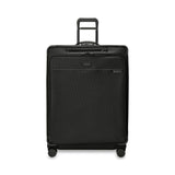 Extra large expandable spinner suitcase in black from Briggs & Riley, featuring smooth wheels and spacious interior.