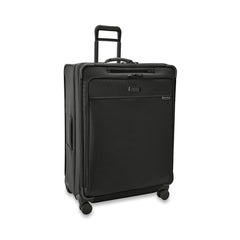 Extra large black expandable spinner suitcase by Briggs & Riley, showcasing durable design and spacious interior for travel.