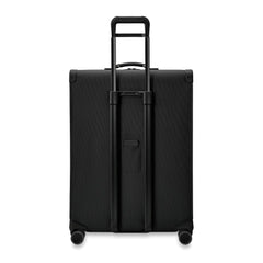 Briggs & Riley Baseline 2 extra large expandable spinner suitcase in black, showcasing its smooth wheels and spacious interior.