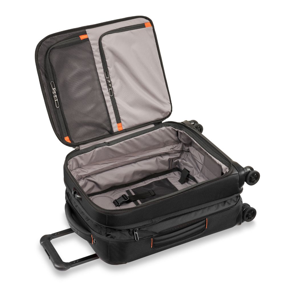 Briggs & Riley ZDX 53cm black carry-on spinner luggage with four wheels and extendable handle.