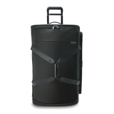 Large black Briggs & Riley Baseline 2 wheel duffle bag with sturdy handles and spacious interior for travel.