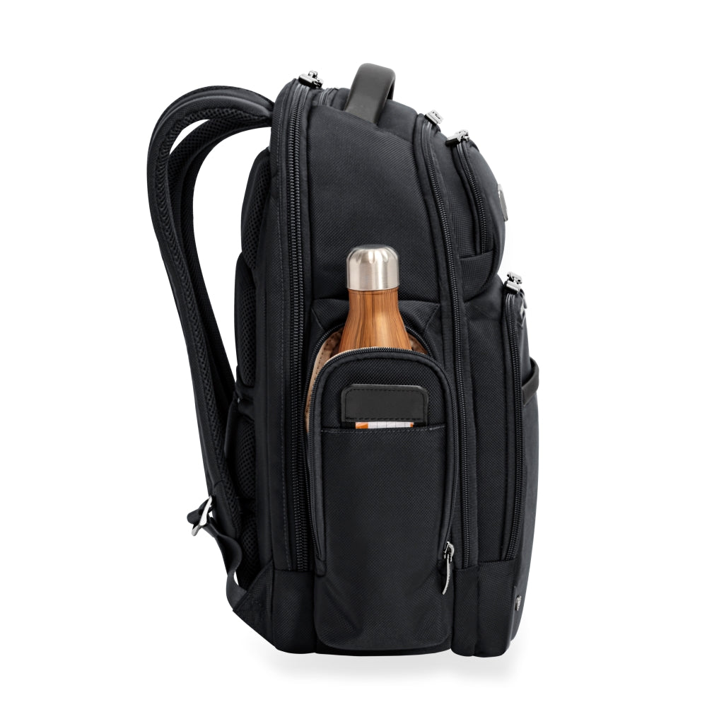 Large black cargo backpack by Briggs & Riley, featuring multiple compartments for work essentials and ergonomic straps.