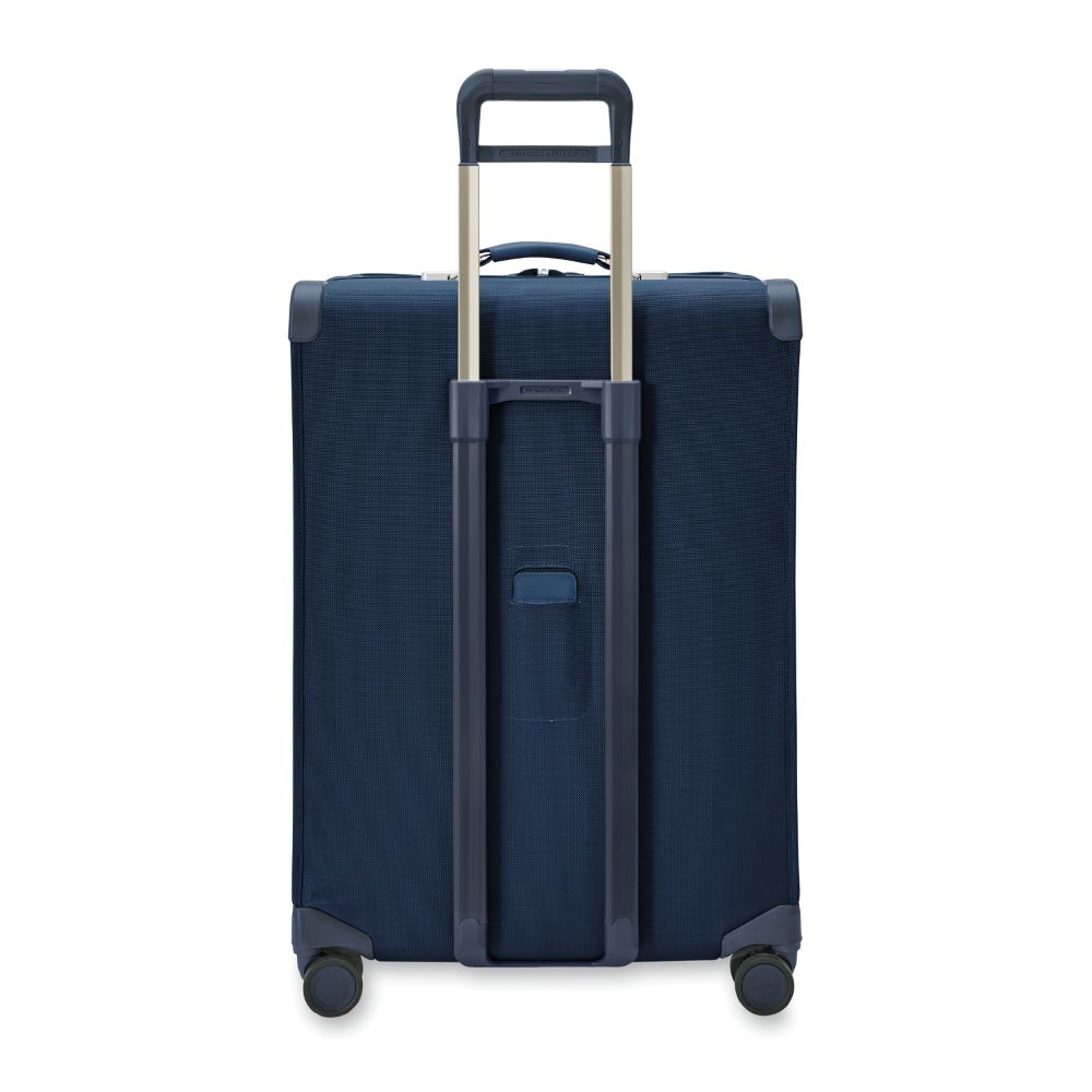 Briggs & Riley Baseline 2 large expandable spinner suitcase in navy, featuring smooth wheels and spacious interior for travel.
