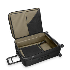 Black large expandable spinner suitcase by Briggs & Riley, showcasing durable design and spacious interior for travel.