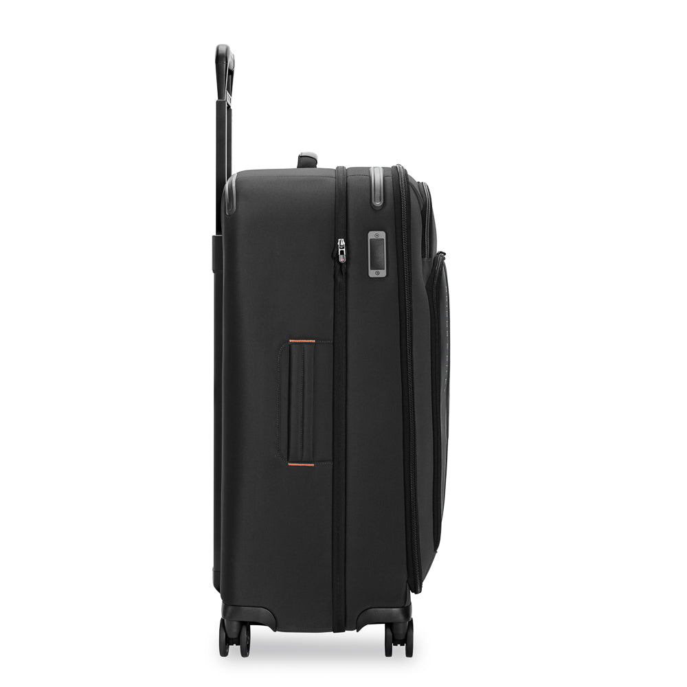 Briggs & Riley ZDX large expandable spinner suitcase in black, showcasing wheels and durable design for travel.
