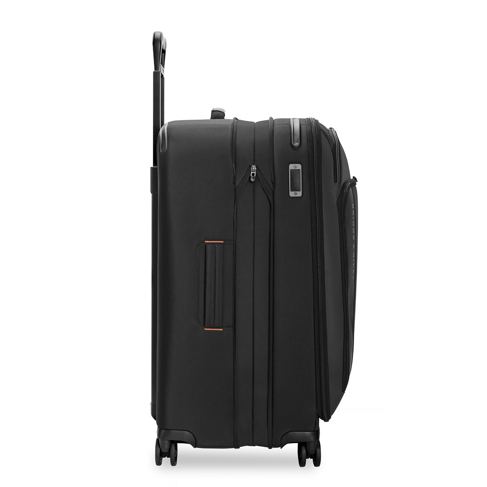 Briggs & Riley ZDX large expandable spinner suitcase in black, featuring four wheels and spacious interior for travel.