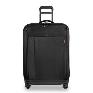 Briggs & Riley ZDX large spinner check-in luggage in black with smooth wheels and sturdy handle for easy transport.