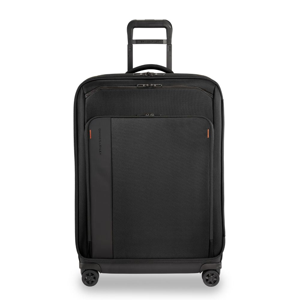 Briggs & Riley ZDX large spinner check-in luggage in black with smooth wheels and sturdy handle for easy transport.