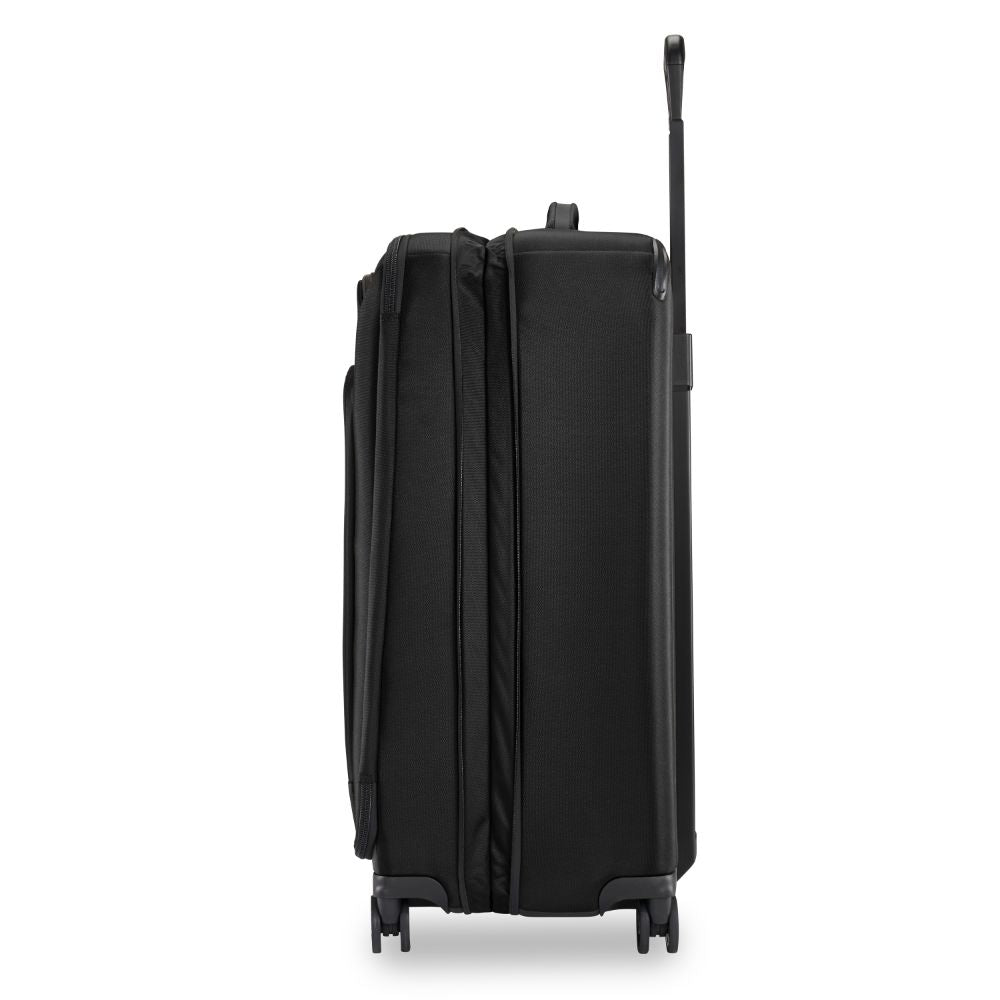 Briggs & Riley ZDX large spinner check-in luggage in black, featuring a sleek design and durable wheels.