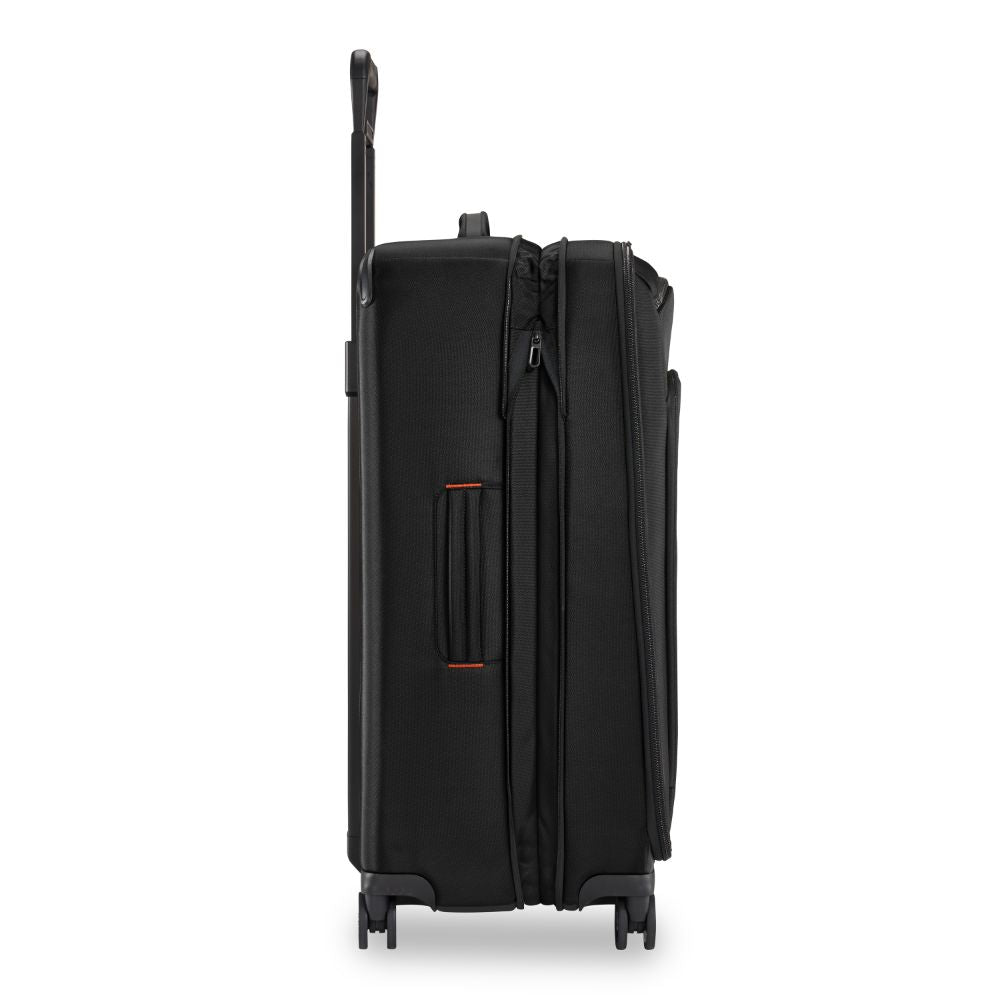 Briggs & Riley ZDX large spinner check-in luggage in sleek black with smooth wheels and sturdy handle for easy travel.