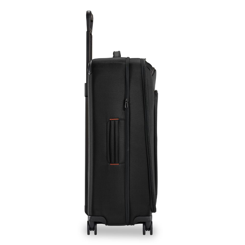 Briggs & Riley ZDX large spinner check-in luggage in black with four wheels and a sleek design.