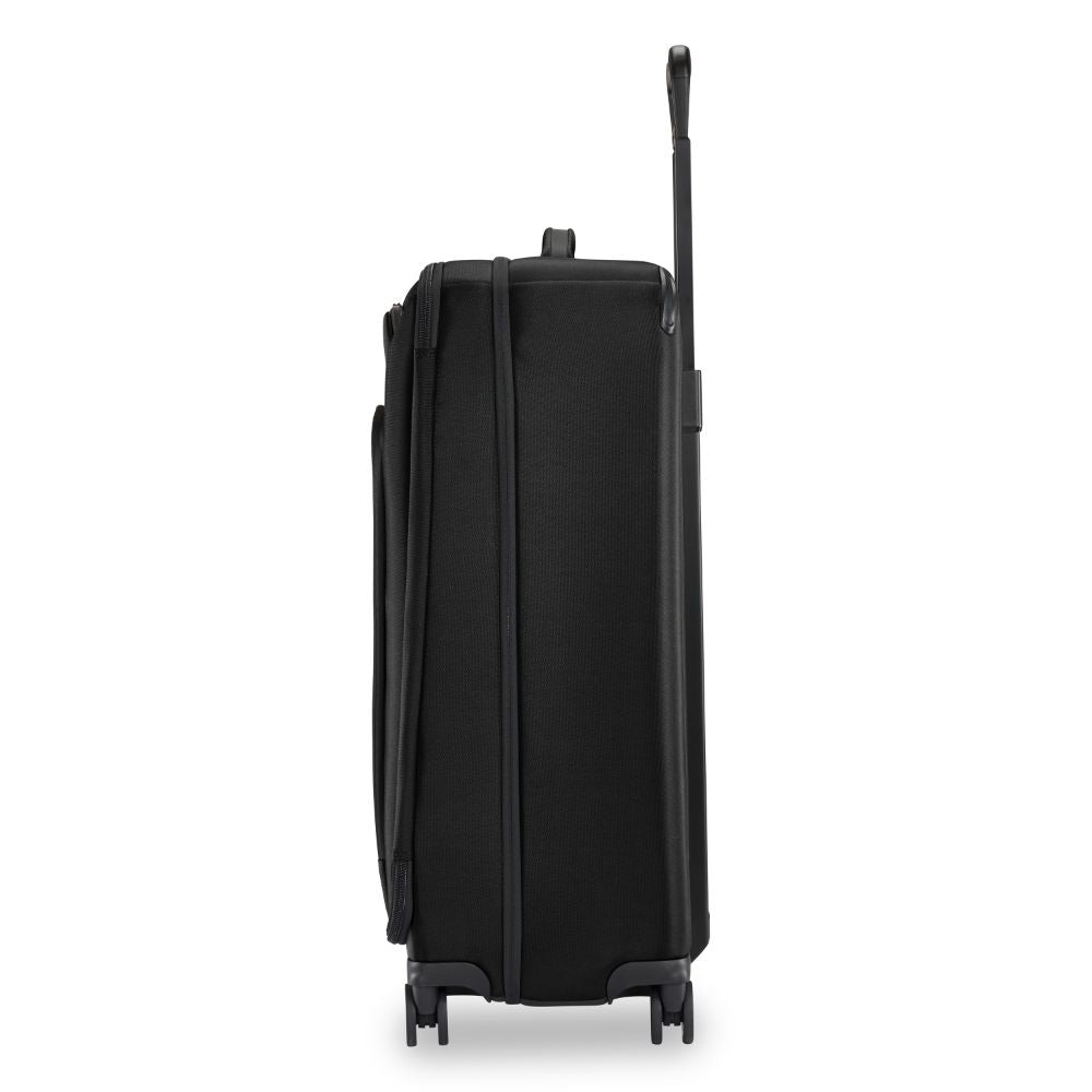 Briggs & Riley Luggage large black spinner check-in luggage with smooth wheels and sturdy handle.