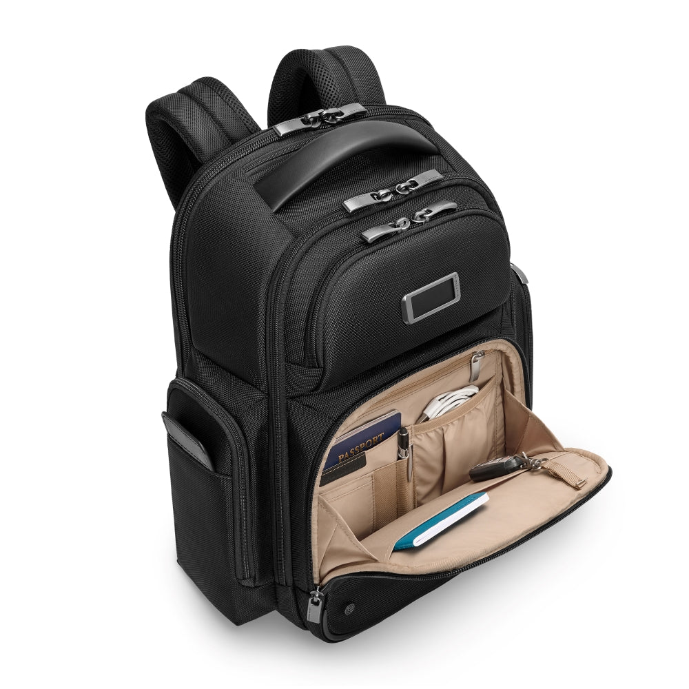 Briggs & Riley black medium cargo backpack with multiple pockets, ideal for work and daily use.