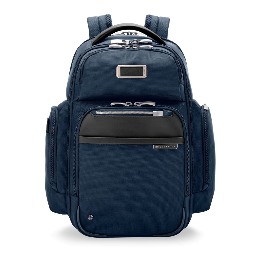 Navy medium cargo backpack by Briggs & Riley, featuring multiple compartments and a durable design for work use.