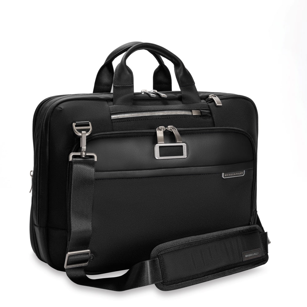 Briggs & Riley black medium expandable briefcase with multiple compartments, ideal for work and travel organization.