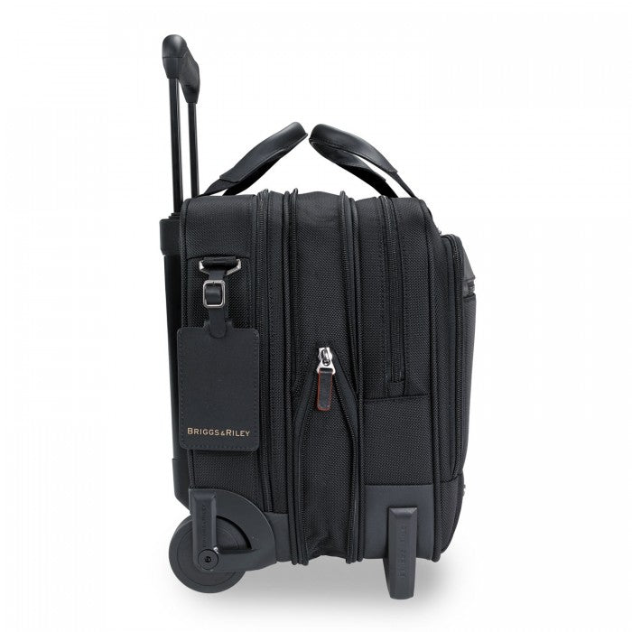 Briggs & Riley medium expandable black briefcase with multiple compartments and a sleek design for work use.