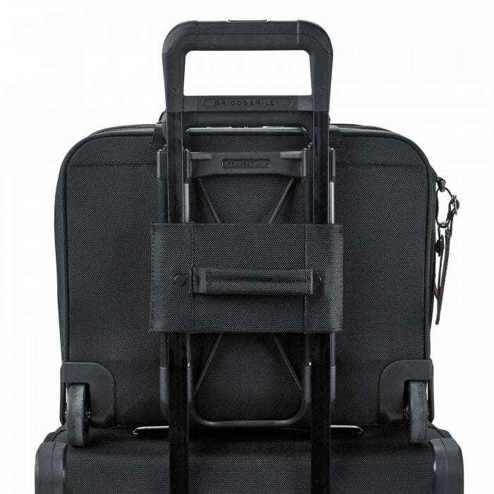 Briggs & Riley black medium expandable briefcase with multiple compartments and sleek design, ideal for work use.