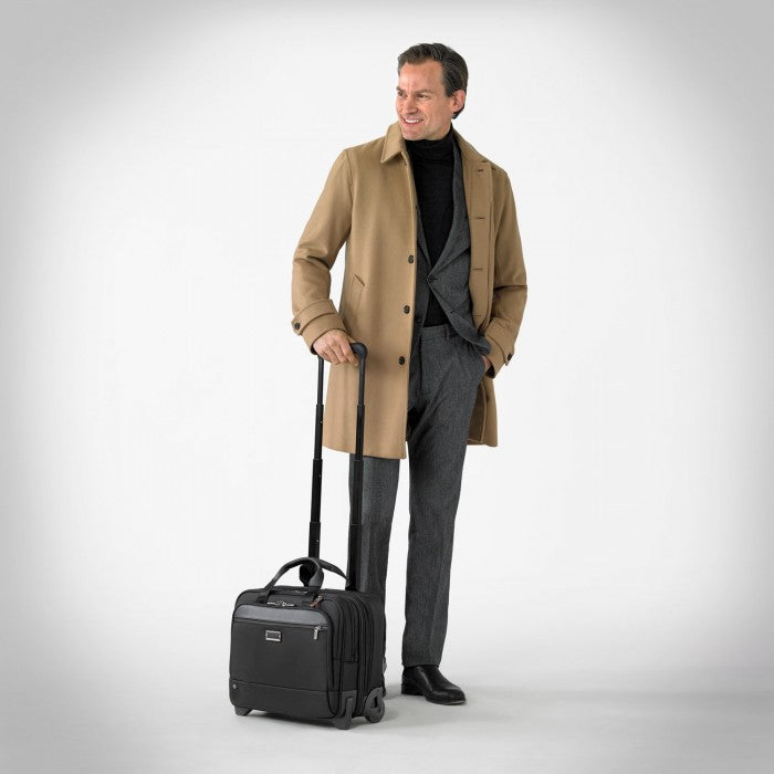 Briggs & Riley Medium Expandable Briefcase in At Work Black with multiple compartments and sleek design.