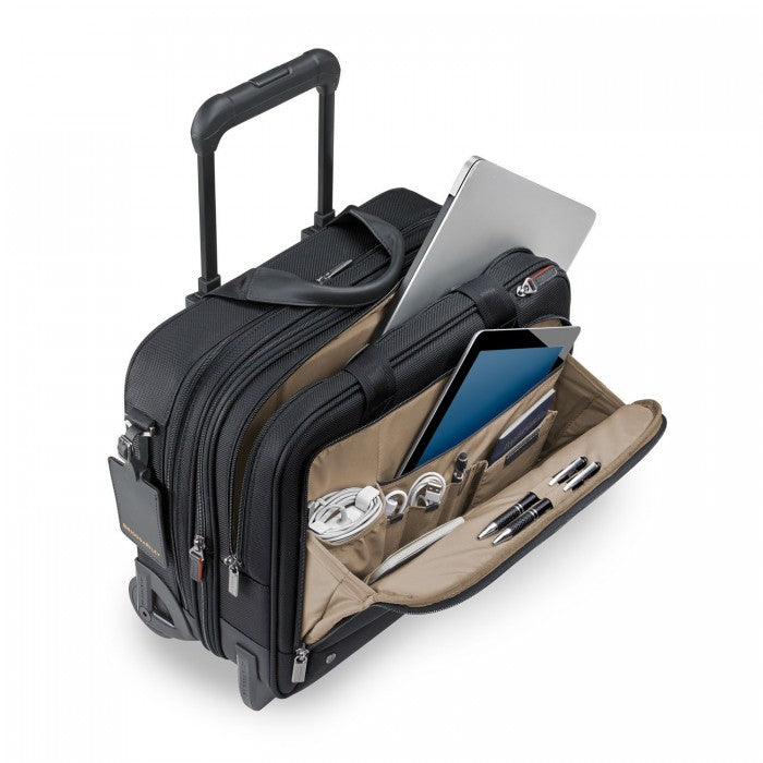 Briggs & Riley black medium expandable briefcase with multiple compartments and a sleek design for professional use.