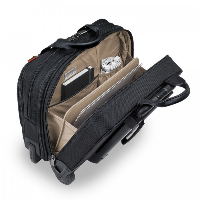 Briggs & Riley At Work Black medium expandable briefcase with multiple compartments and a sleek design.