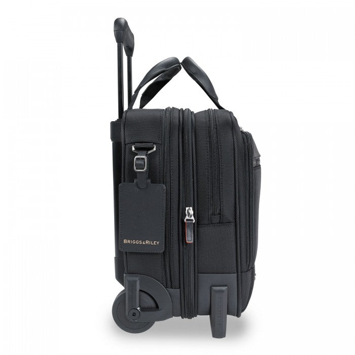 Medium expandable black briefcase by Briggs & Riley, featuring sleek design and multiple compartments for organization.