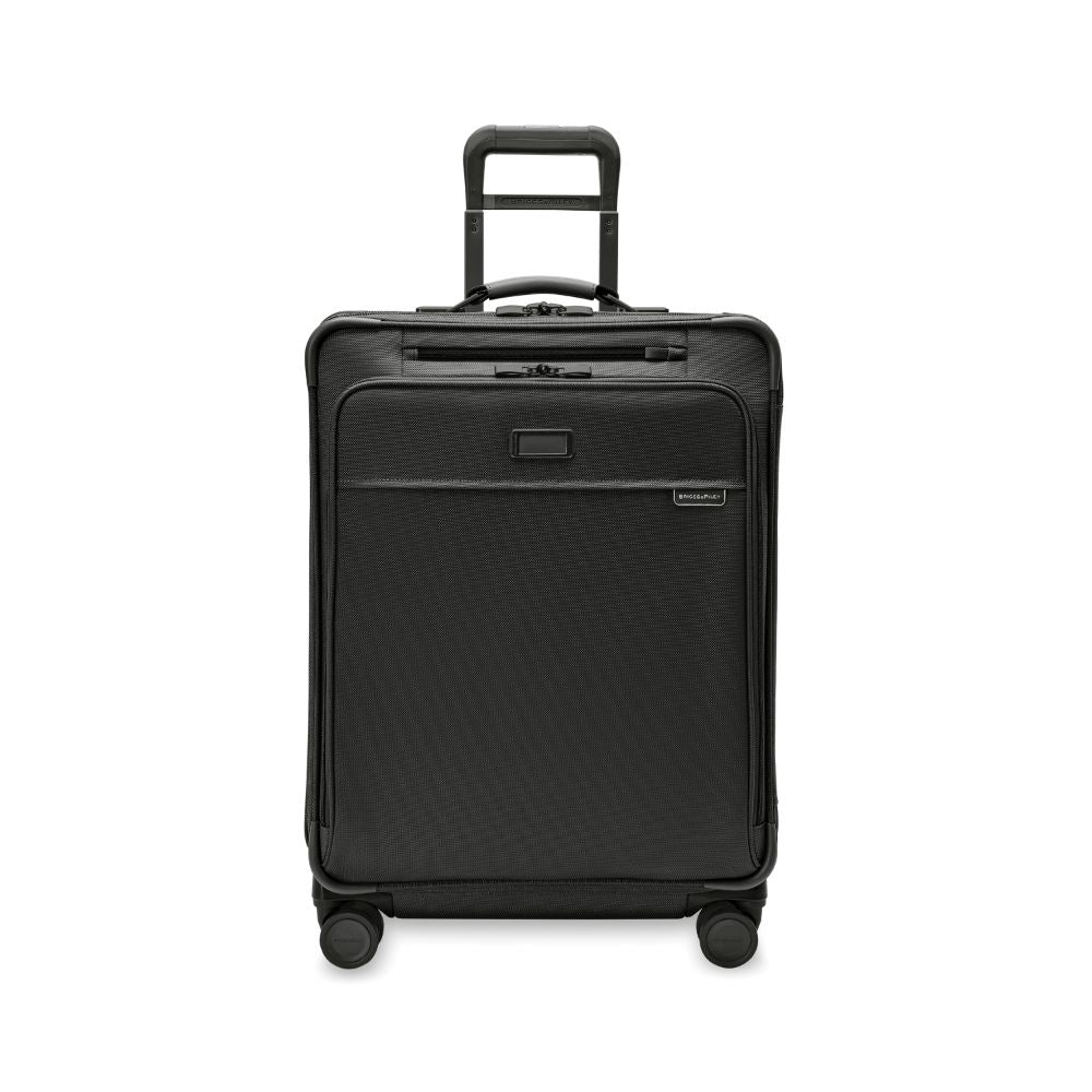 Briggs & Riley Baseline 2 medium expandable spinner suitcase in black, showcasing its sleek design and durable wheels.