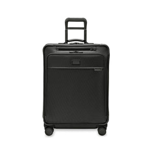 Briggs & Riley Baseline 2 medium expandable spinner suitcase in black, showcasing its sleek design and durable wheels.