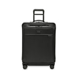 Briggs & Riley Baseline 2 medium expandable spinner suitcase in black, showcasing its sleek design and durable wheels.