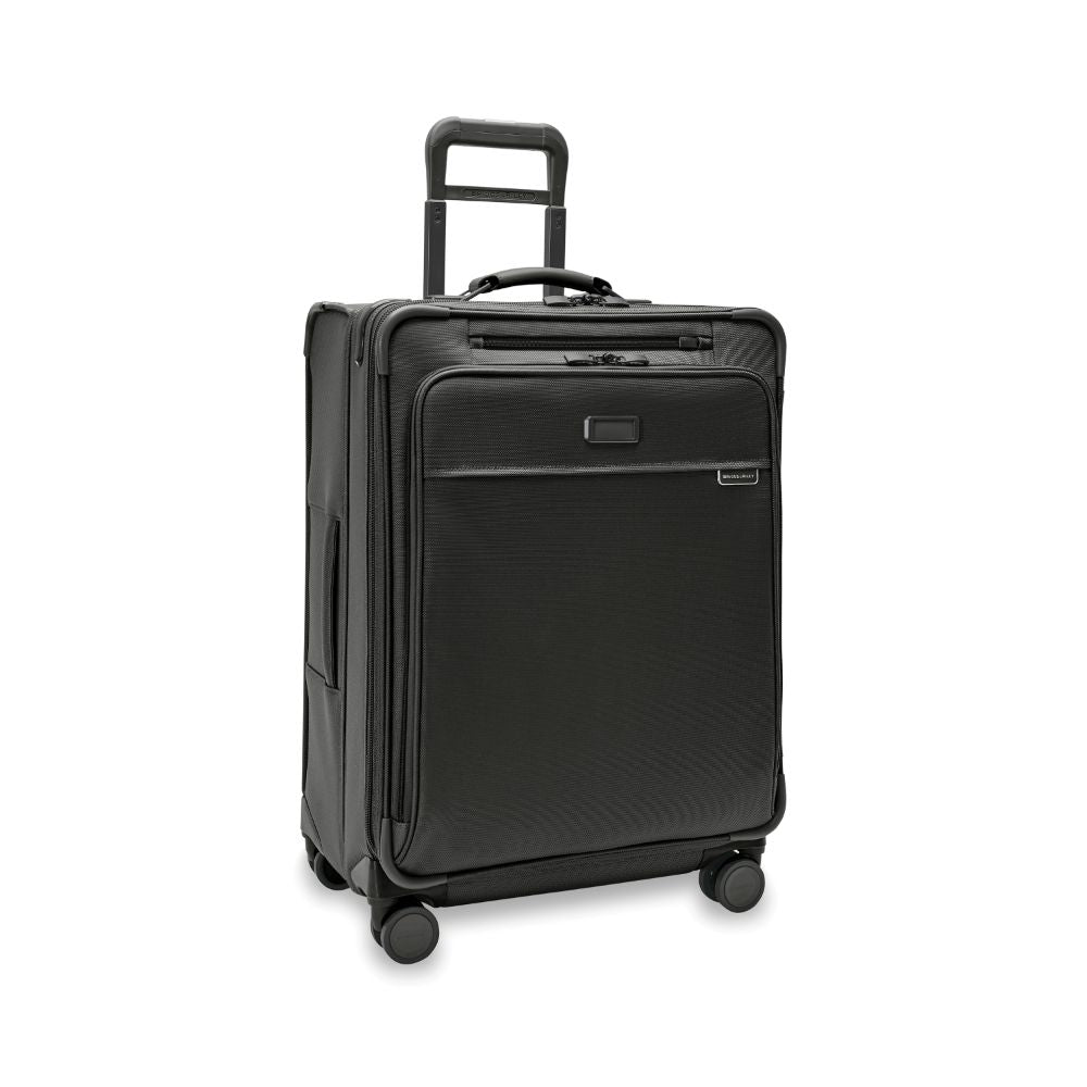 Briggs & Riley Baseline 2 medium expandable spinner suitcase in black, showcasing wheels and handle design.