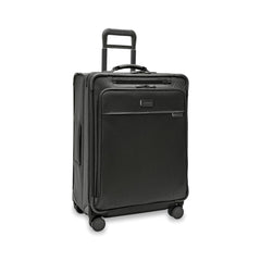 Briggs & Riley Baseline 2 medium expandable spinner suitcase in black, showcasing wheels and handle design.