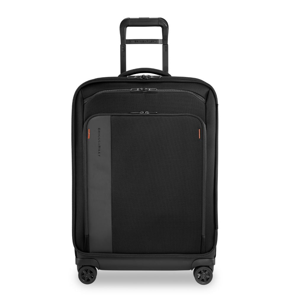 Briggs & Riley ZDX medium spinner check-in luggage in black with smooth wheels and sturdy handle for easy travel.