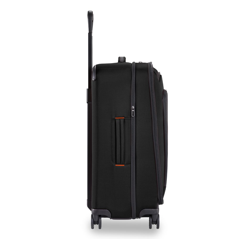 Briggs & Riley ZDX medium spinner check-in luggage in black with smooth wheels and spacious interior compartments.