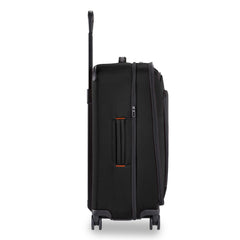 Briggs & Riley ZDX medium spinner check-in luggage in black with smooth wheels and spacious interior compartments.