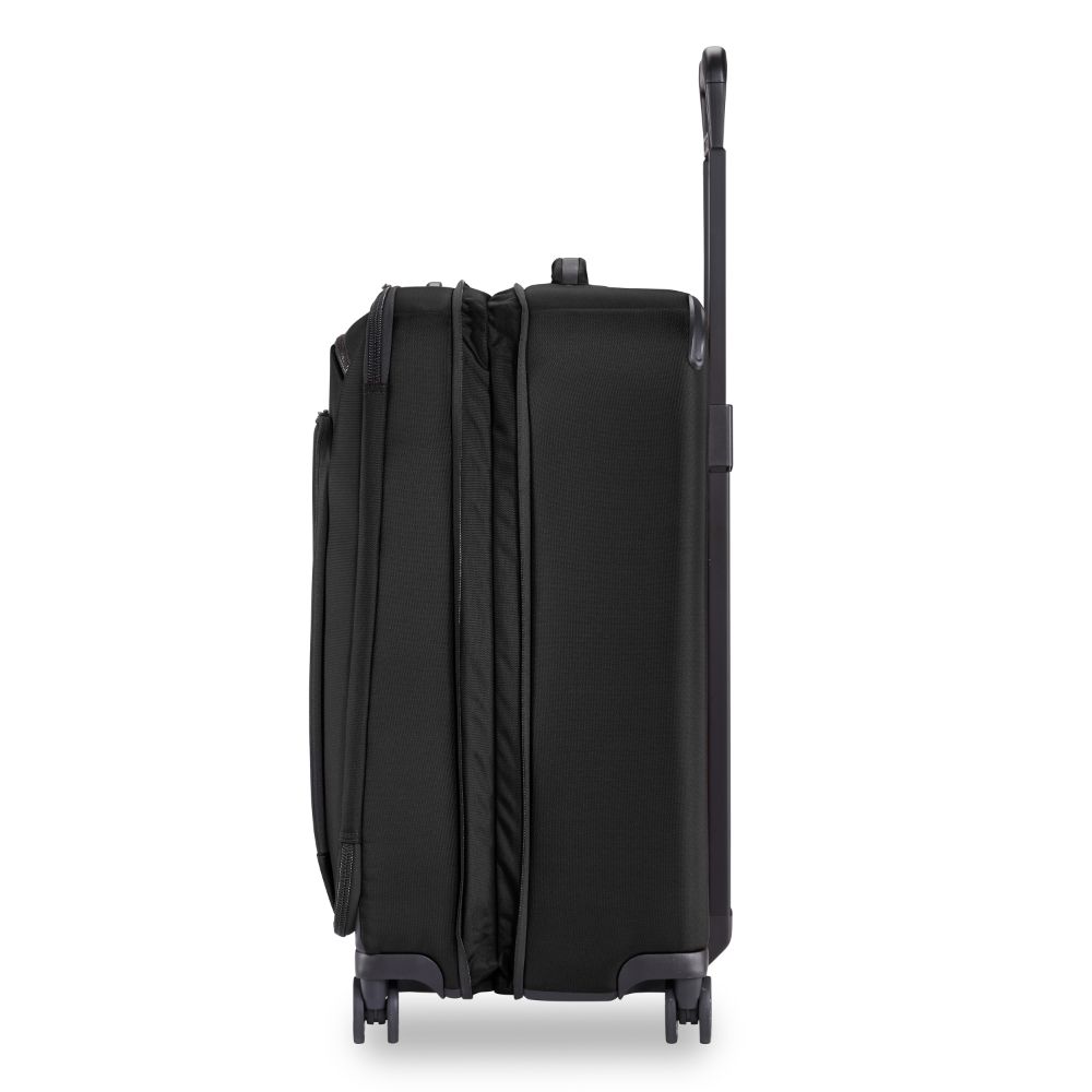 Briggs & Riley ZDX medium spinner check-in luggage in black, featuring durable wheels and a sleek design.