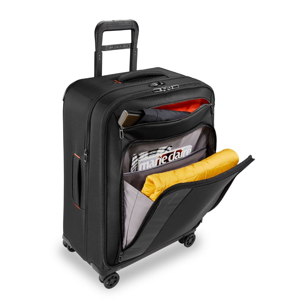 Briggs & Riley ZDX medium check-in luggage spinner in black, featuring durable wheels and spacious interior.