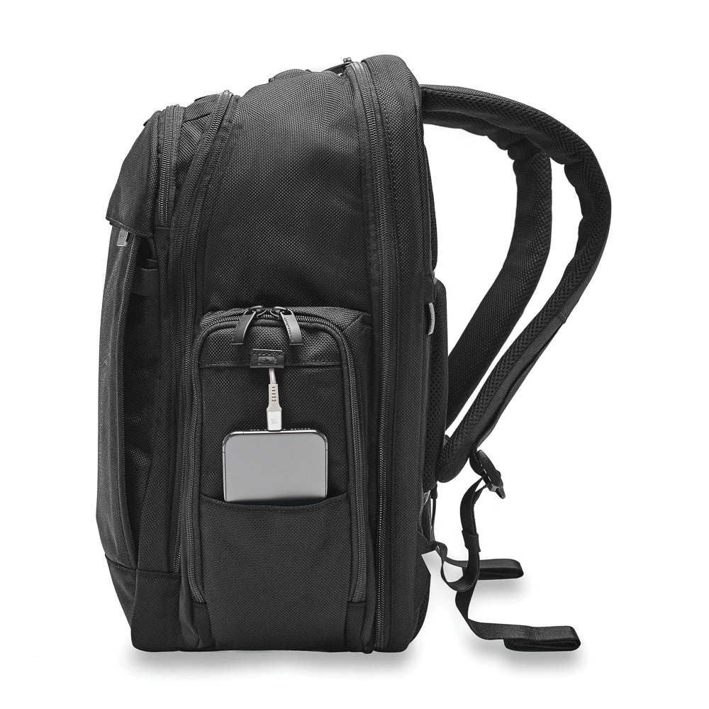 Black Briggs & Riley Baseline 2 travel backpack with multiple compartments and ergonomic design for comfortable carrying.