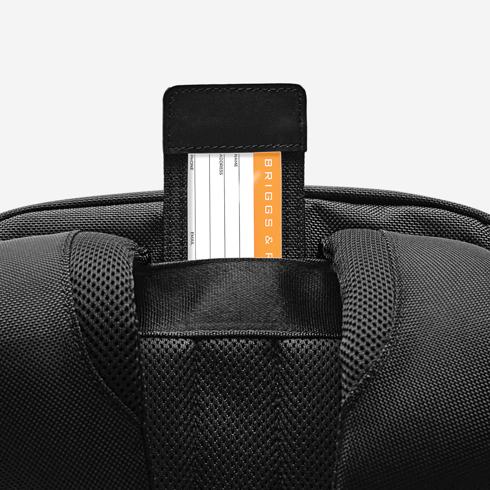 Briggs & Riley Baseline 2 travel backpack in black, featuring adjustable straps and multiple compartments for organization.