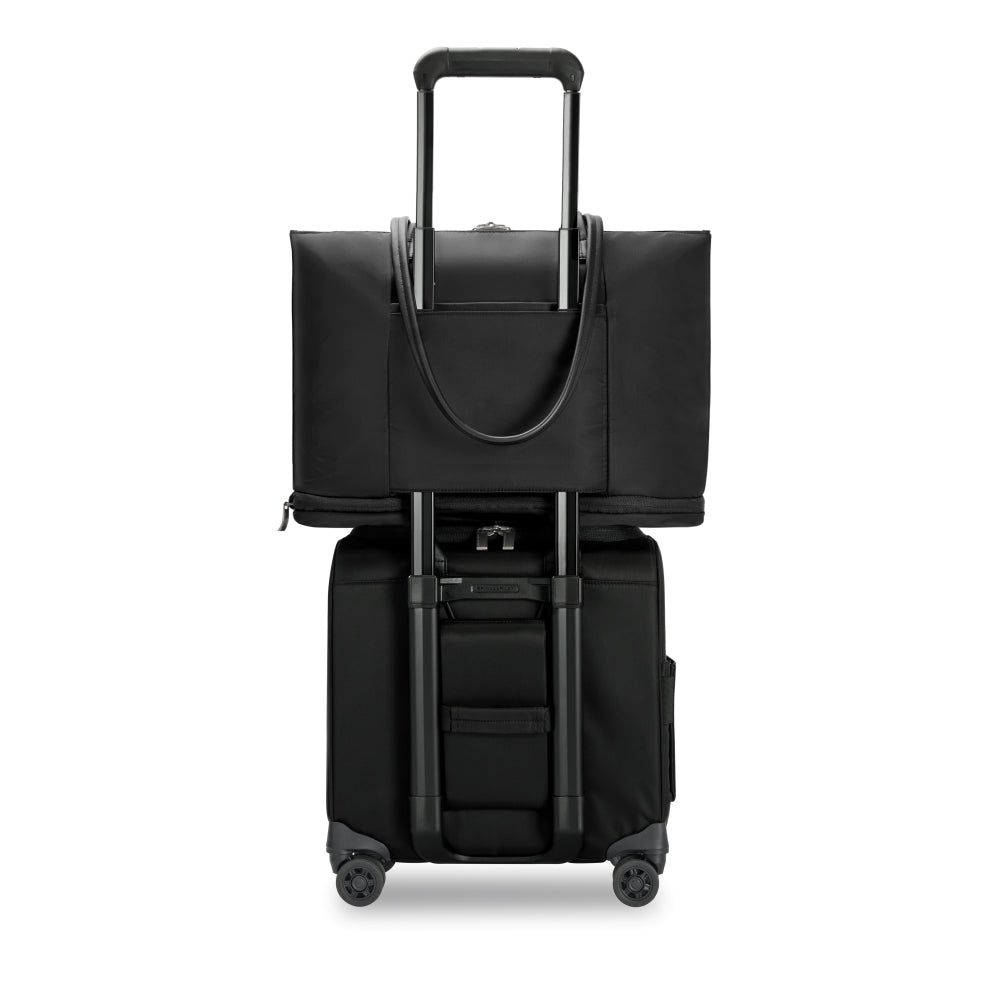 Briggs & Riley Rhapsody wheeled cabin suitcase in black with a sleek design and durable wheels for easy travel.