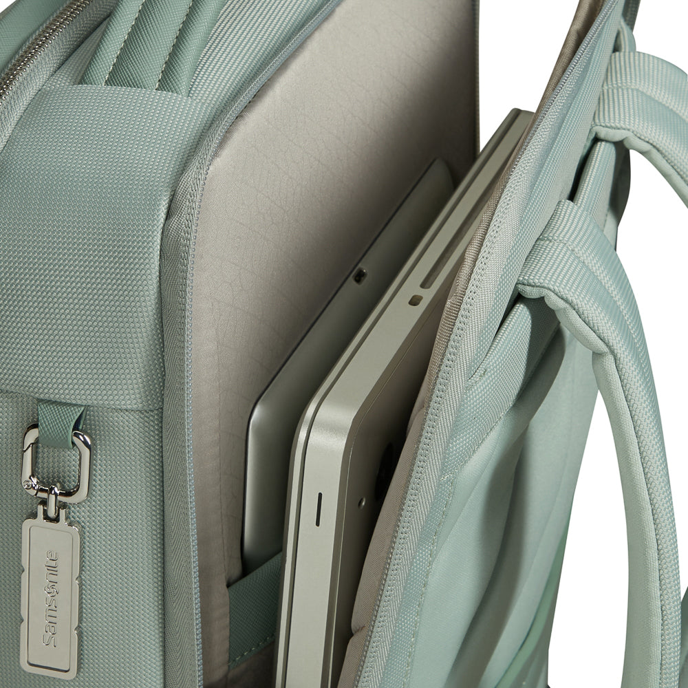 Samsonite 15.6" laptop backpack in thyme green, featuring padded compartments and adjustable shoulder straps.