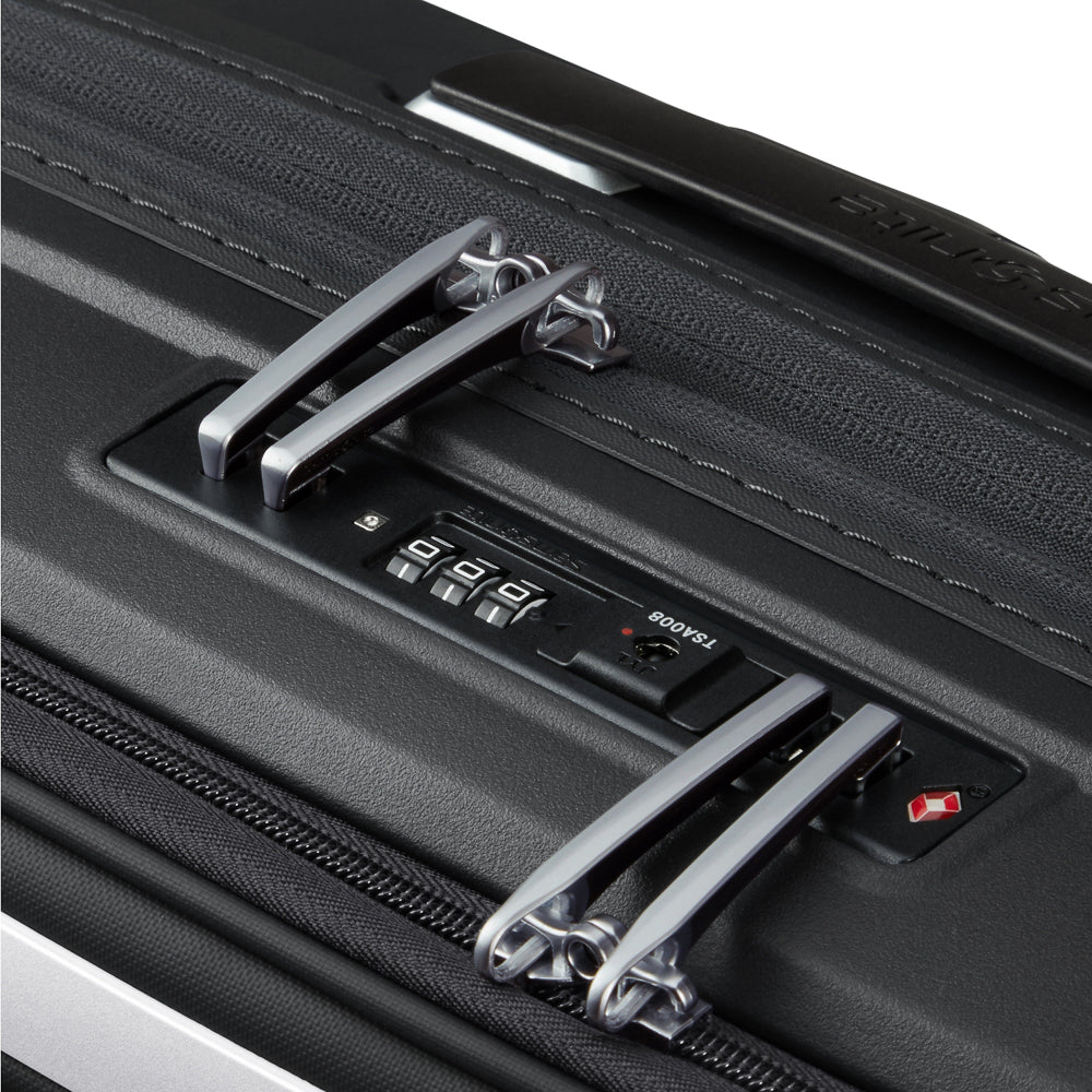 Samsonite 55cm black cabin suitcase with front pocket, featuring durable design and smooth wheels for easy travel.
