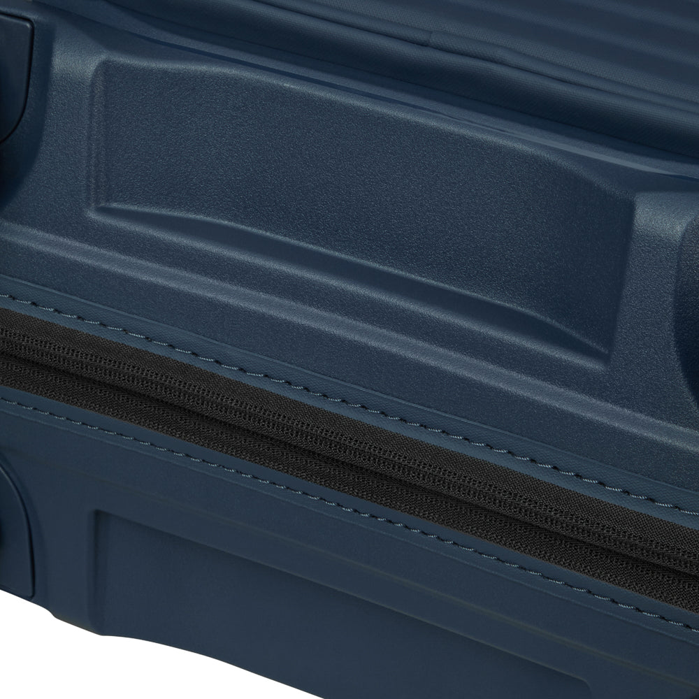 Blue 55cm cabin suitcase with front pocket by Samsonite, featuring durable wheels and a sleek design for travel convenience.