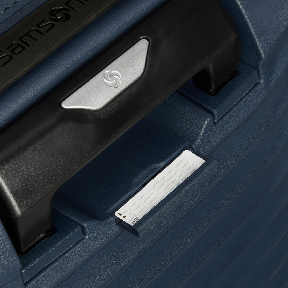 Blue 55cm Samsonite Upscape cabin suitcase with front pocket, showcasing durable design and smooth wheels.