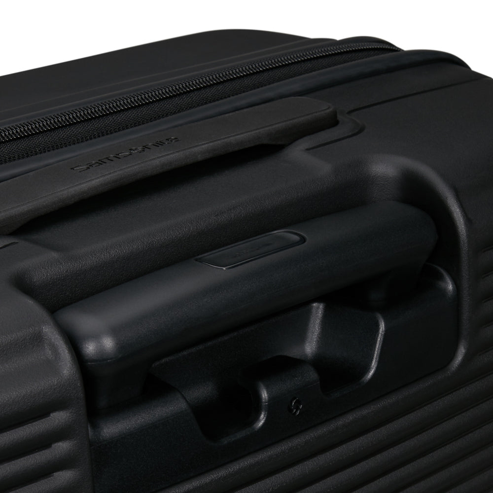 Samsonite Paralux 55cm black cabin suitcase with front pocket, showcasing durable design and convenient travel features.