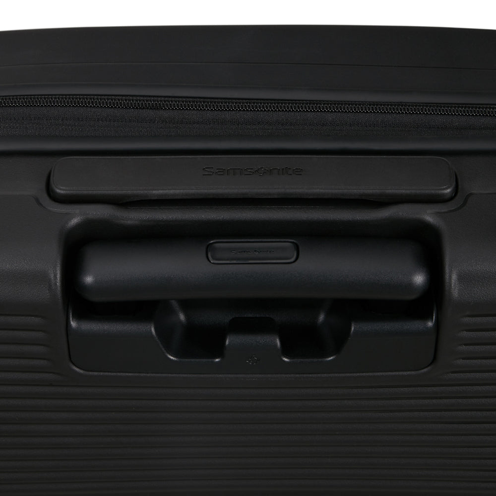 Black 55cm cabin suitcase with front pocket by Samsonite, showcasing durable design and spacious interior for travel.