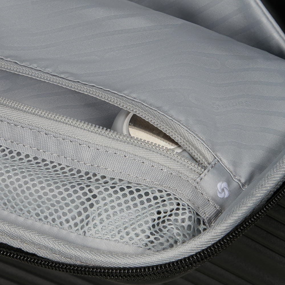 Black 55cm cabin suitcase with front pocket by Samsonite, showcasing sleek design and durable materials.