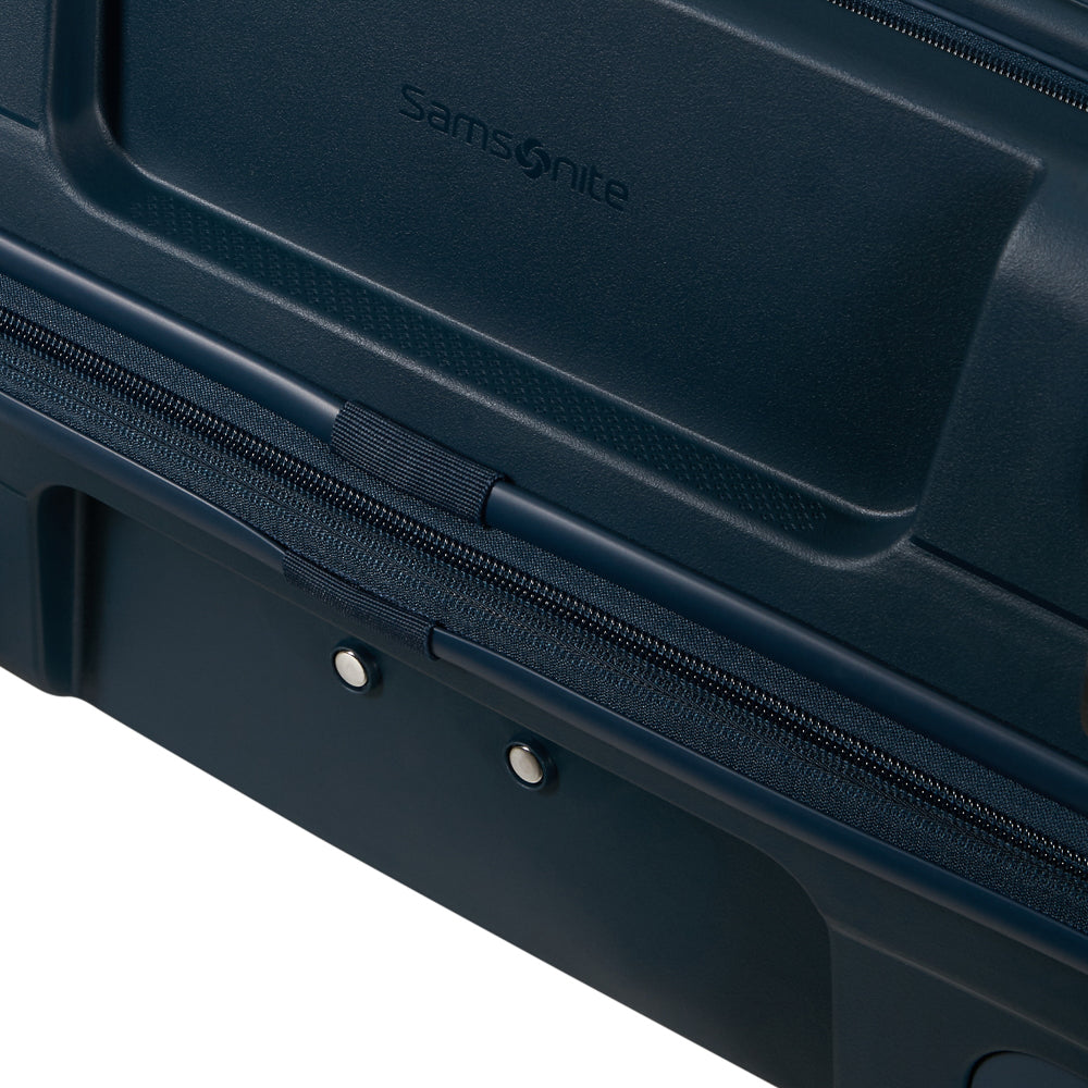 Navy 55cm cabin suitcase with front pocket by Samsonite, featuring durable design and convenient carry handle.